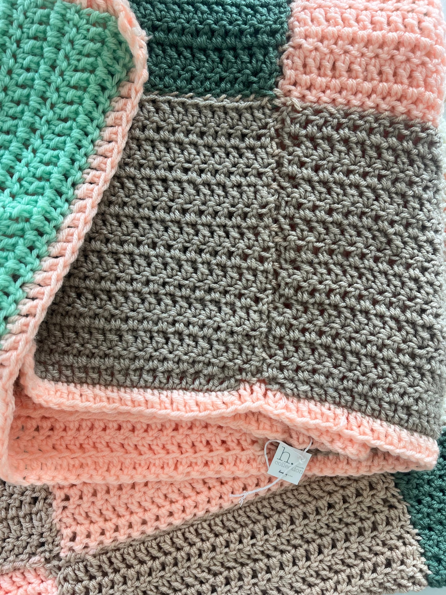 Hand knit block pattern blanket