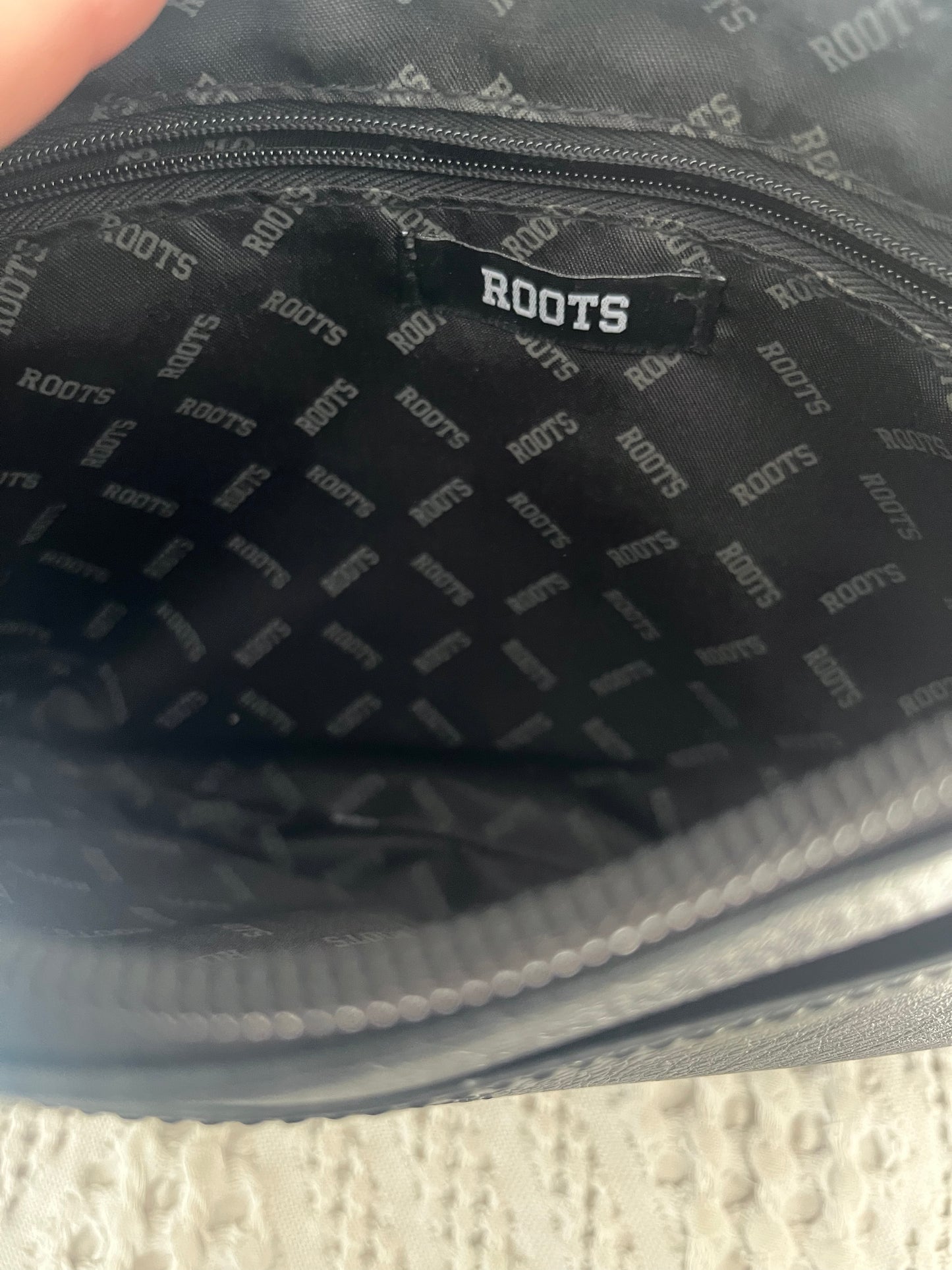 Black ROOTS shoulder bag