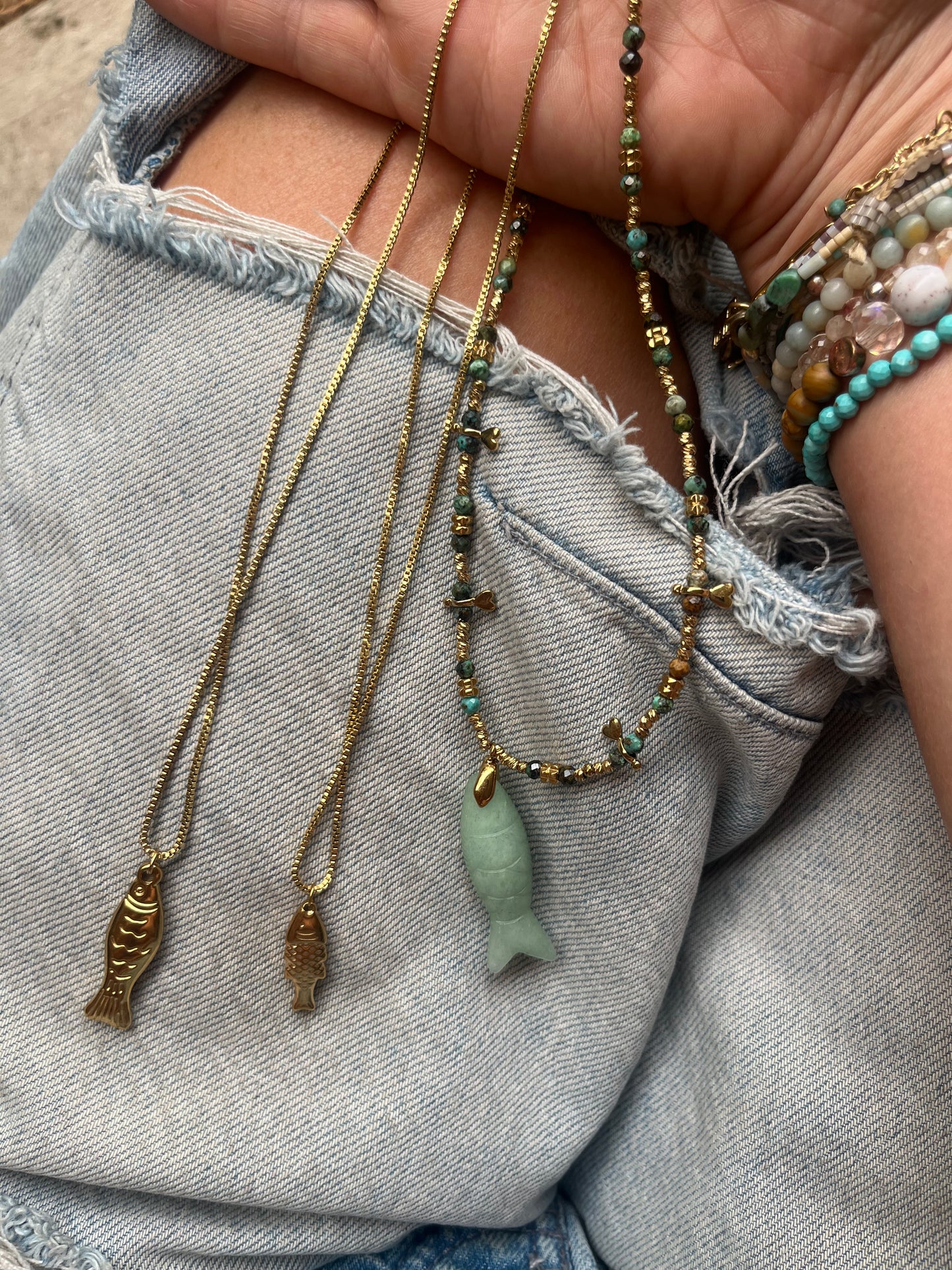 Small gold fish necklace