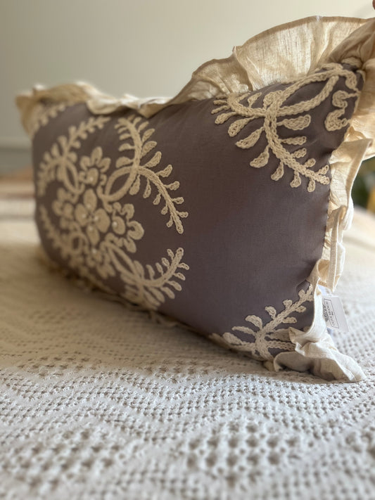 Grey and cream pillow