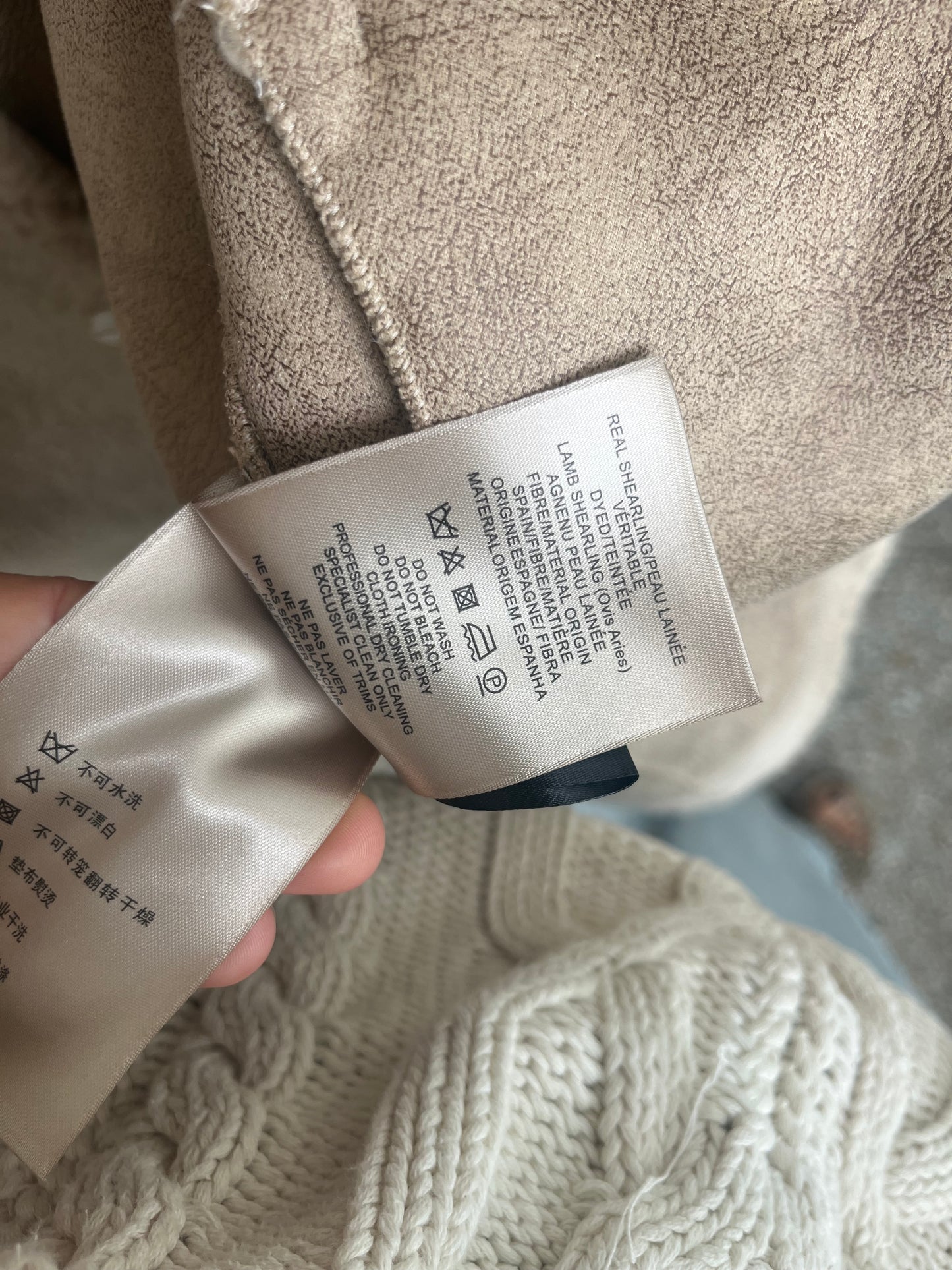 The JACKET. 100% lamb shearling in SIZE small with leather tie buttons. RARE!