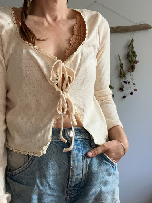 Pale yellow eyelit tie-up shirt NO SIZE fits like a large