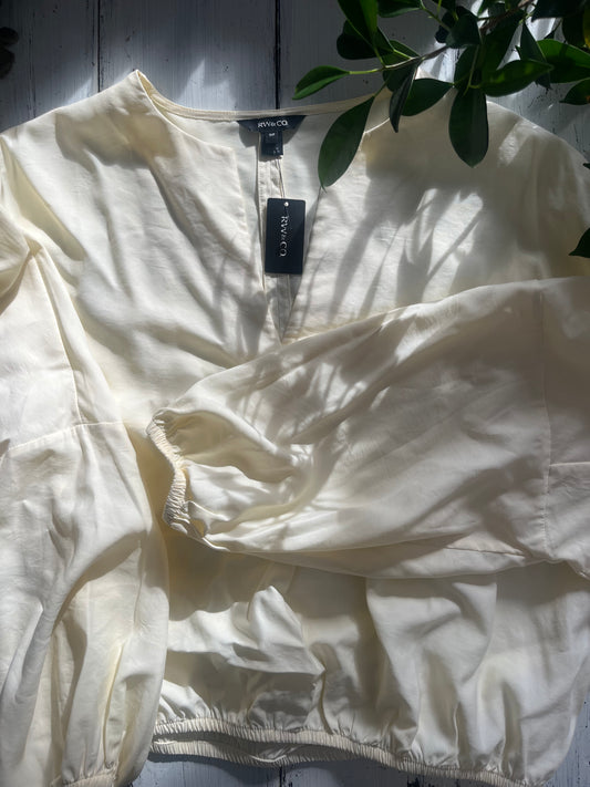 NWT pale yellow/cream ballon sleeve top SIZE small (will fit a medium )